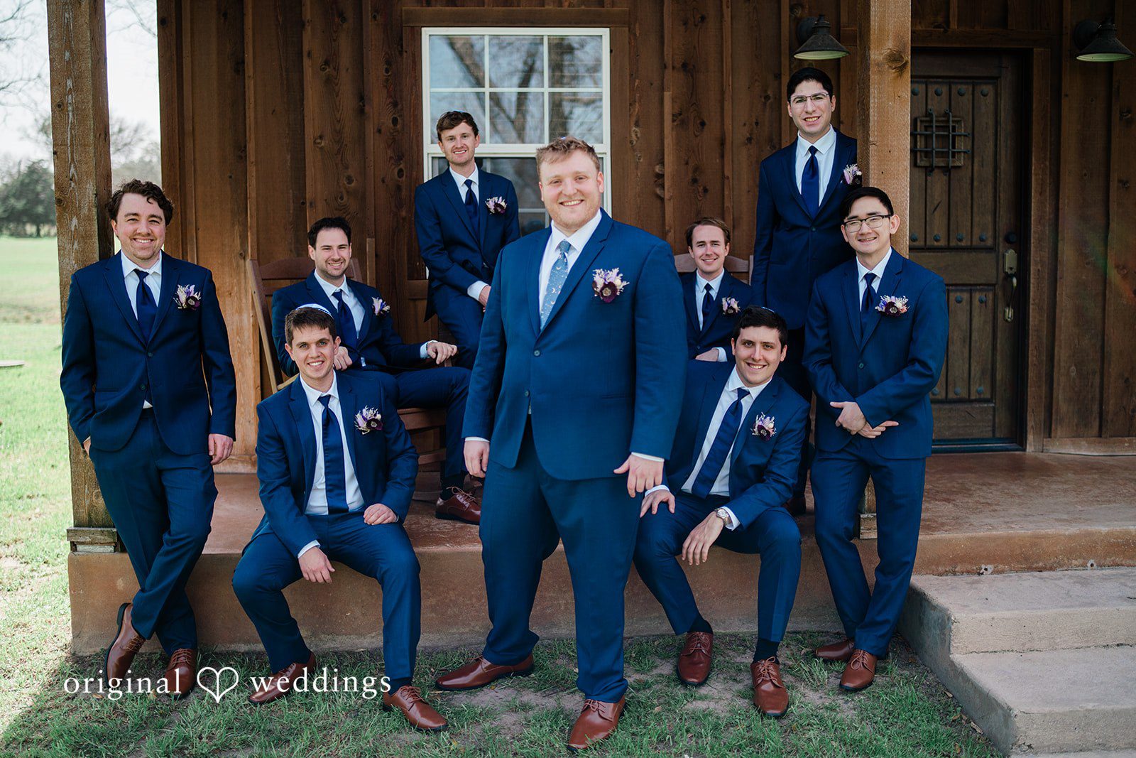 A stunning portrait of the groom and his groomsmen at The Orchard Event Venue & Retreat