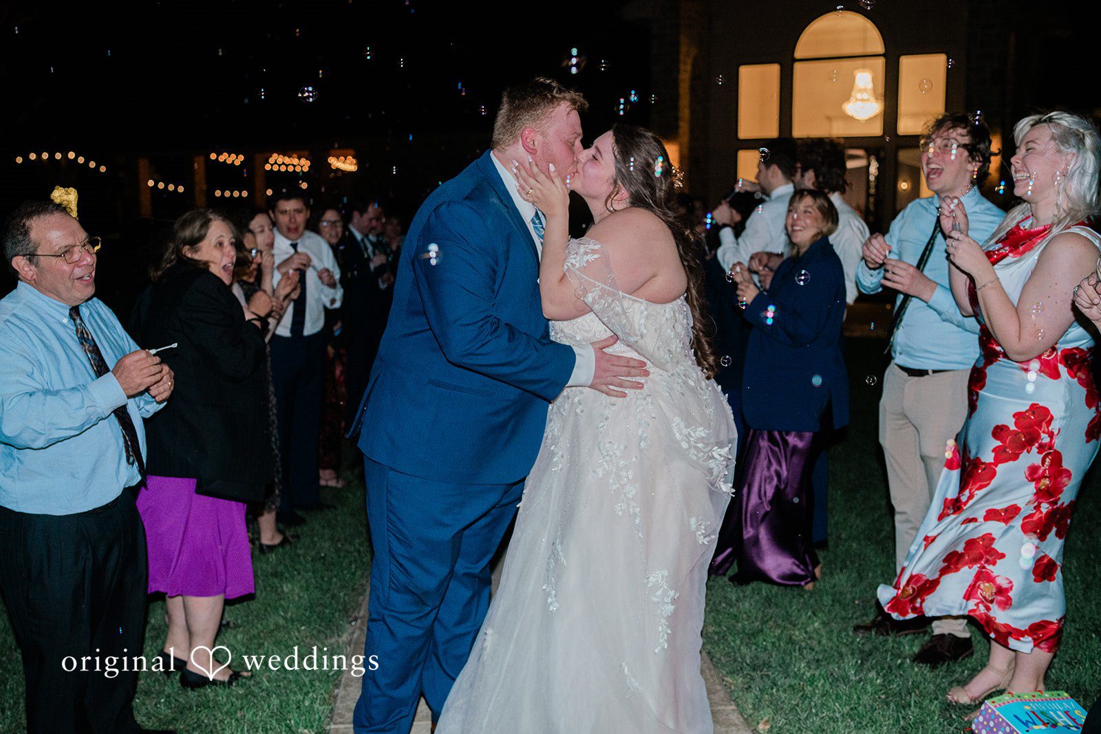 The couple shares a romantic kiss to seal the night