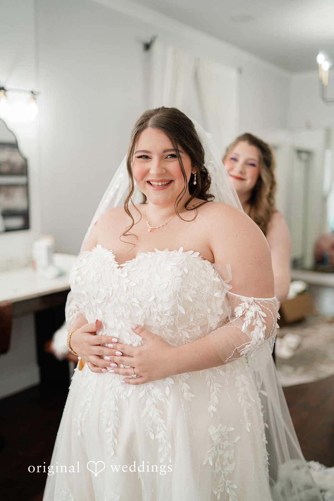 The bride excitedly gets ready