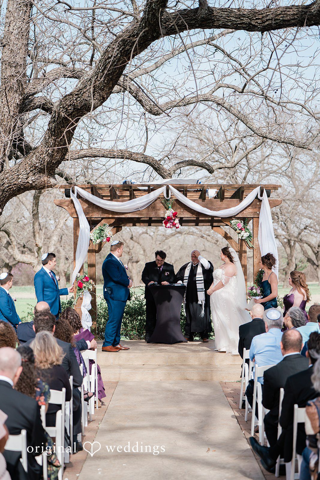 The priest about unites the couple