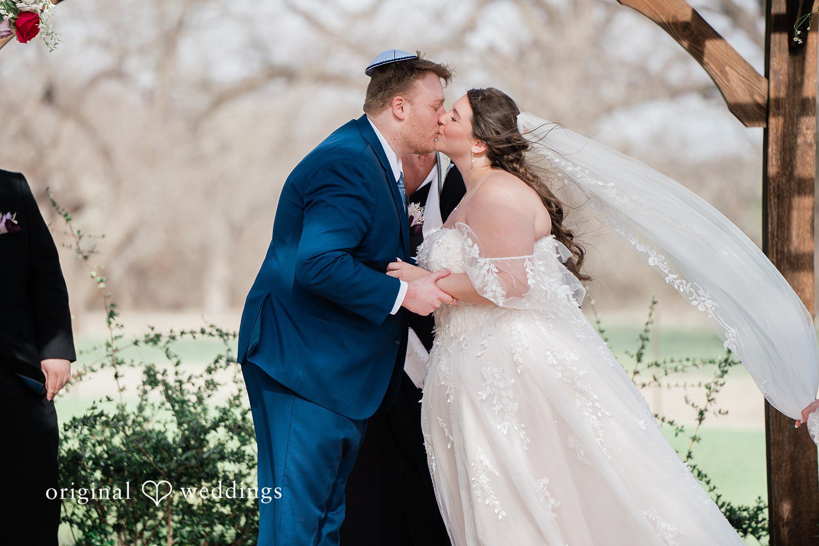 The couple shares their first kiss