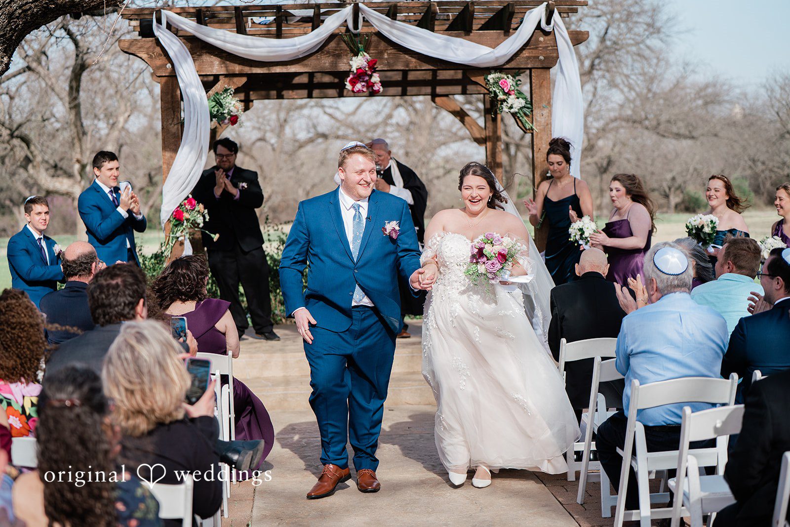 Our Dallas wedding photographers captured the beautiful exit of the couple after their wedding ceremony