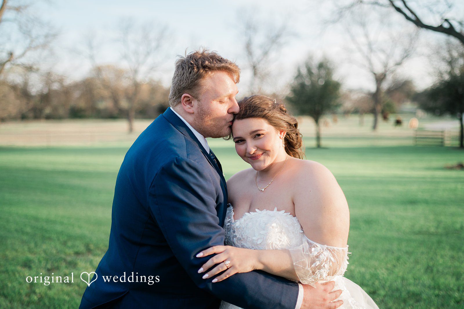 A romantic portrait of the couple at the Orchard Event Venue & Retreat's outdoor space