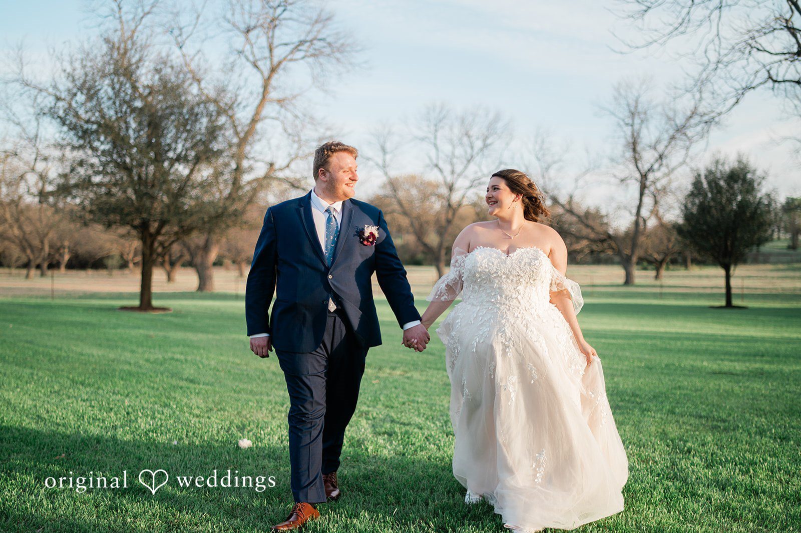 Our Dallas wedding photographers at Original Weddings captured a beautiful outdoor portrait of the couple at the Orchard Event Venue & Retreat
