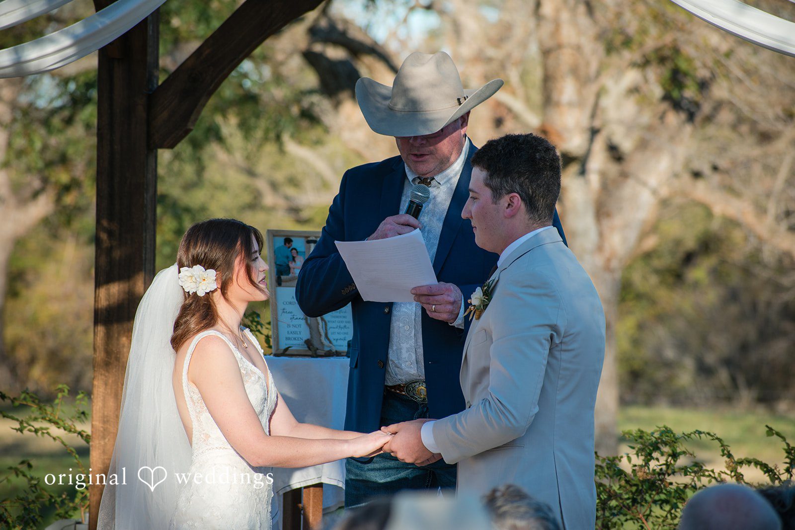 Bonnie + Aksel Romantic wedding interaction shot at The Orchard Event Venue & Retreat