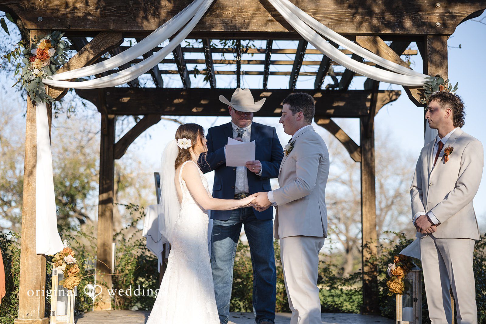 Bonnie + Aksel Romantic bride and groom eye contact at The Orchard Event Venue & Retreat
