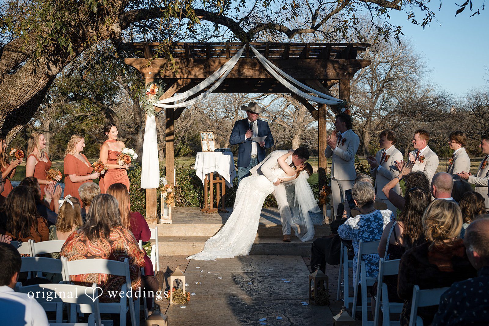 Bonnie + Aksel Romantic wedding kiss moment at The Orchard Event Venue & Retreat
