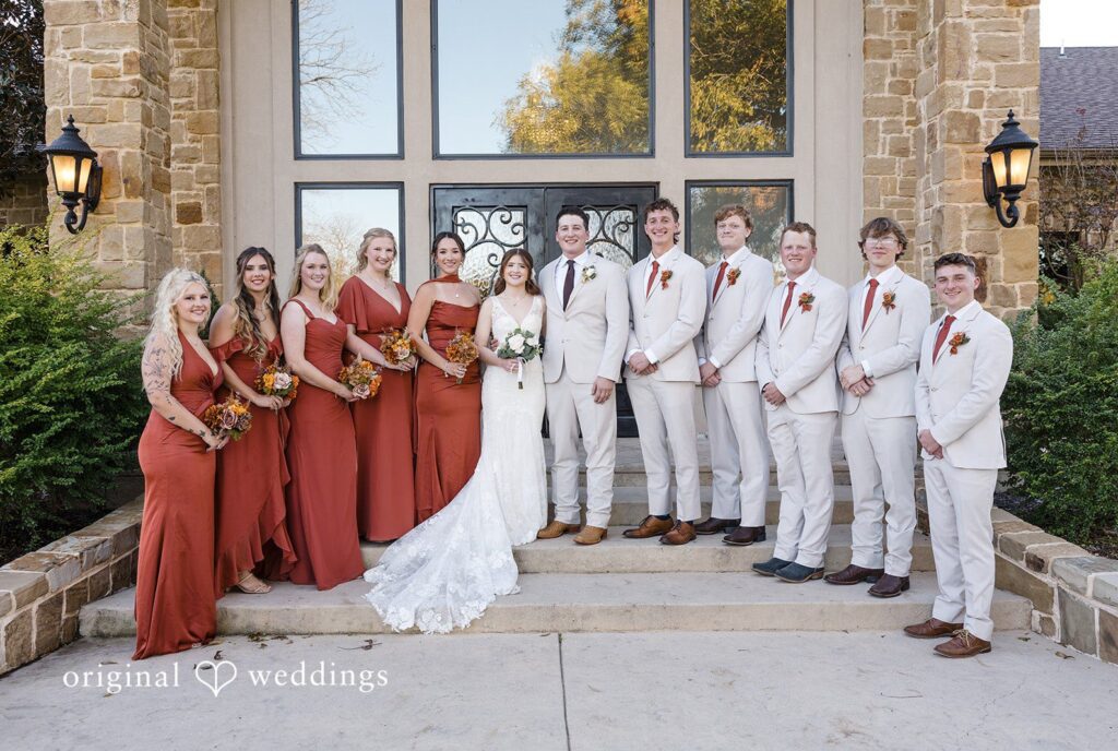 Bonnie + Aksel Dallas Wedding Photographers capturing couple group photo with bridesmaids and groomsmen at The Orchard Event Venue & Retreat by Original Weddings