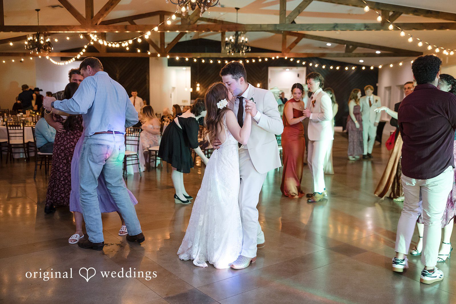 Bonnie + Aksel Emotional romantic kiss moment of couple while dancing at The Orchard Event Venue & Retreat