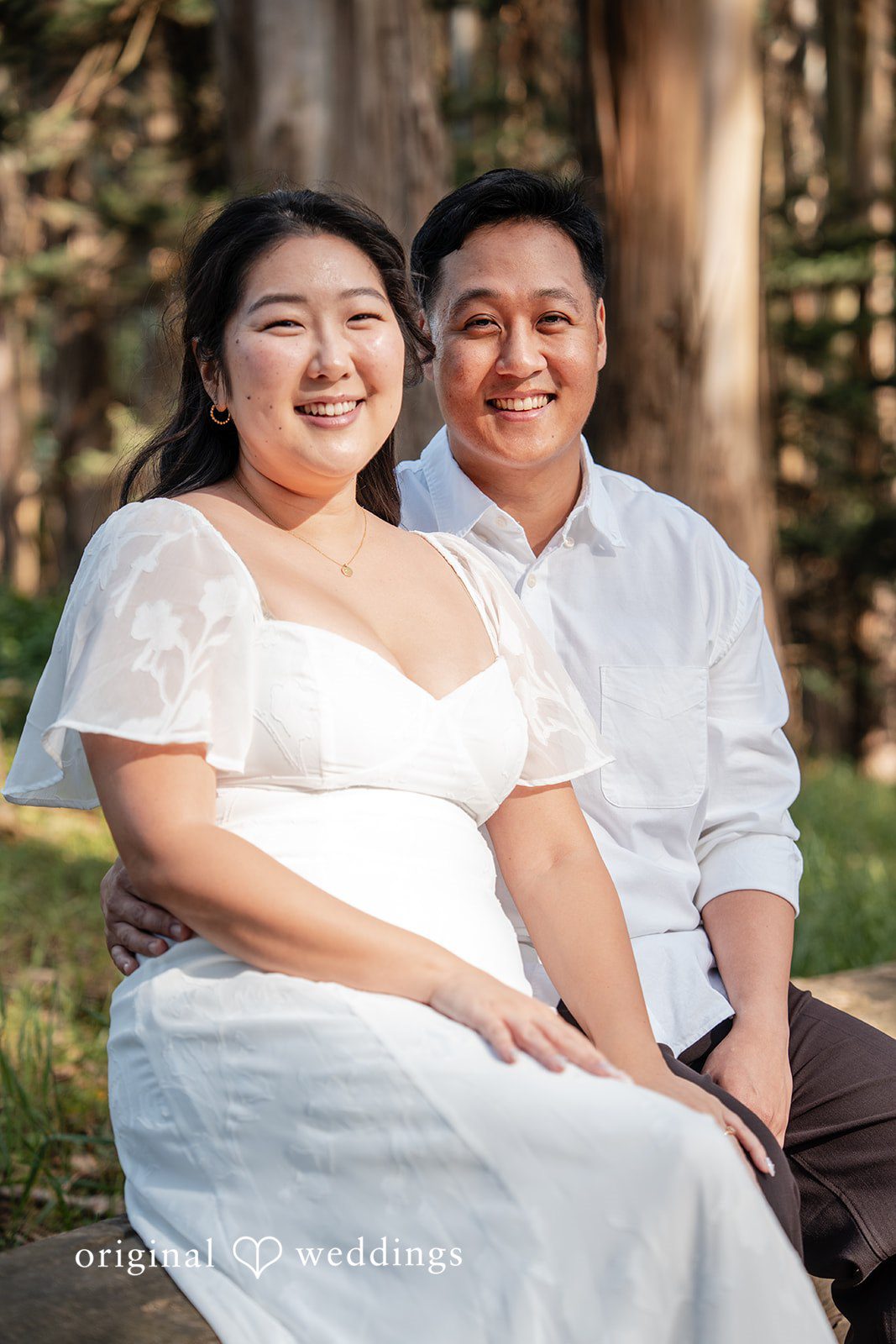 Couple smiling together during their session at The Presidio
