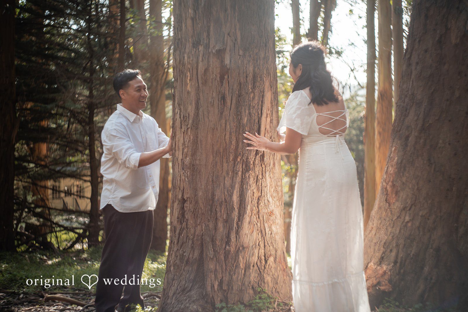 A playful and intimate moment between a couple during their engagement session at The Presidio