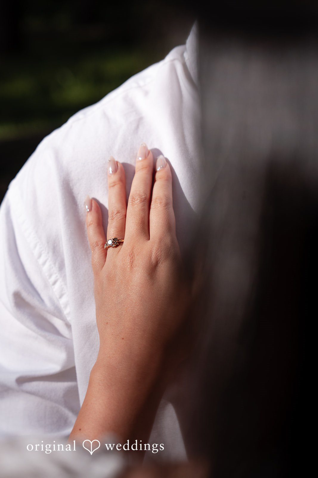San Francisco Engagement Photography at The Presidio from Original Weddings capturing a close-up of the engagement ring.