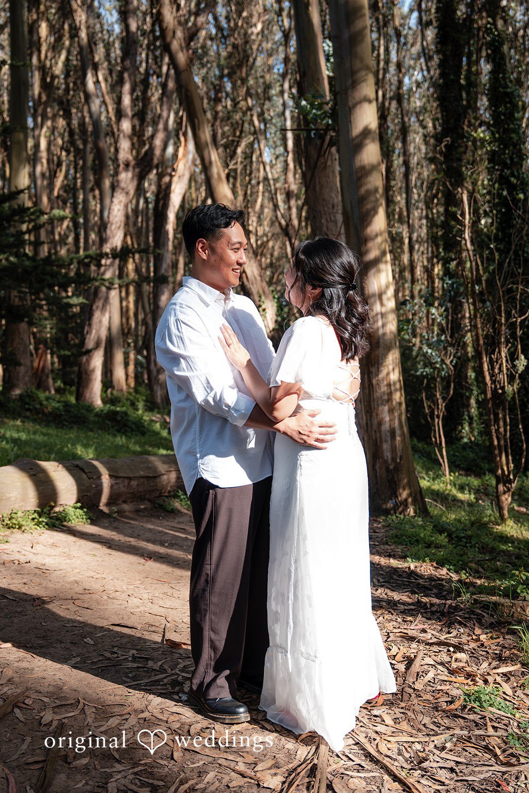 Romantic moment of couple during an outdoor engagement session at The Presidio