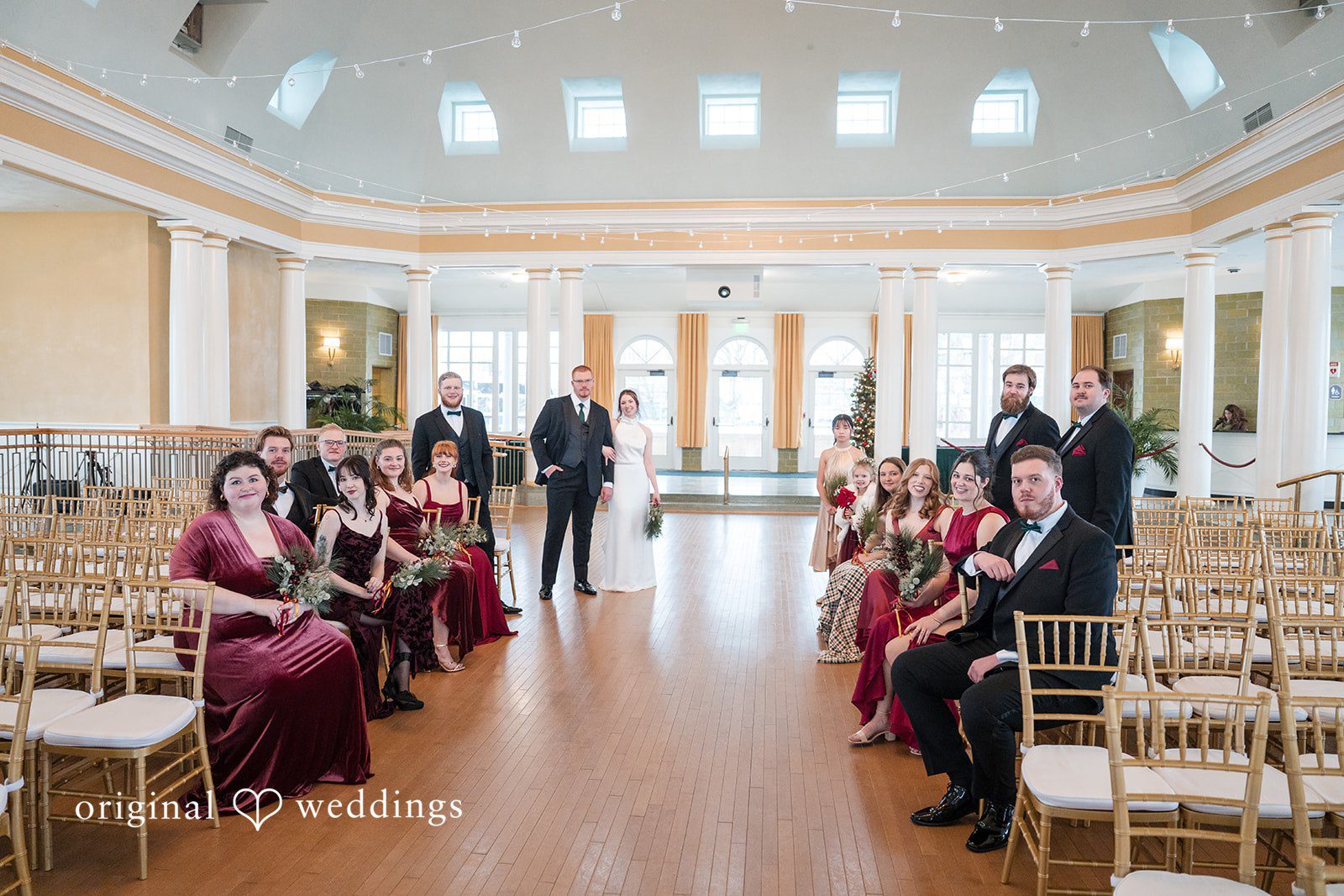 Samantha + James A stylish portrait of the couple and their bridal party in The Riviera Ballroom