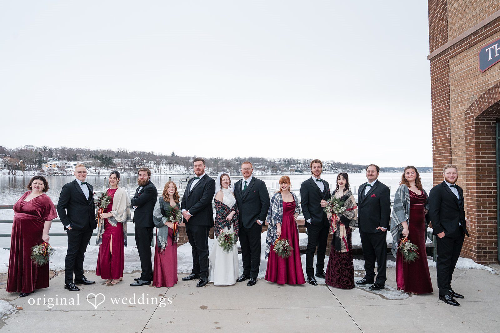 Our Milwaukee wedding photographers at Original Weddings captured a stunning portrait of the couple and their bridal party at The Riviera Ballroom