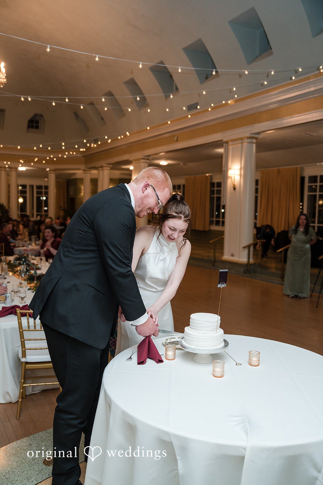 Samantha + James The couple cuts their wedding cake