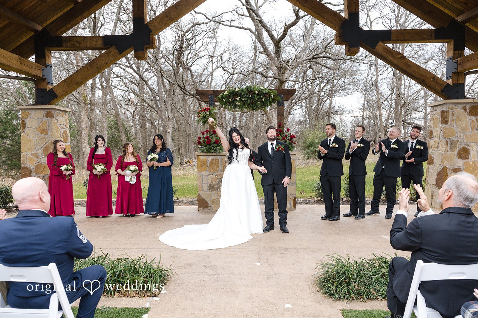 Bride and bridesmaids portrait outdoors