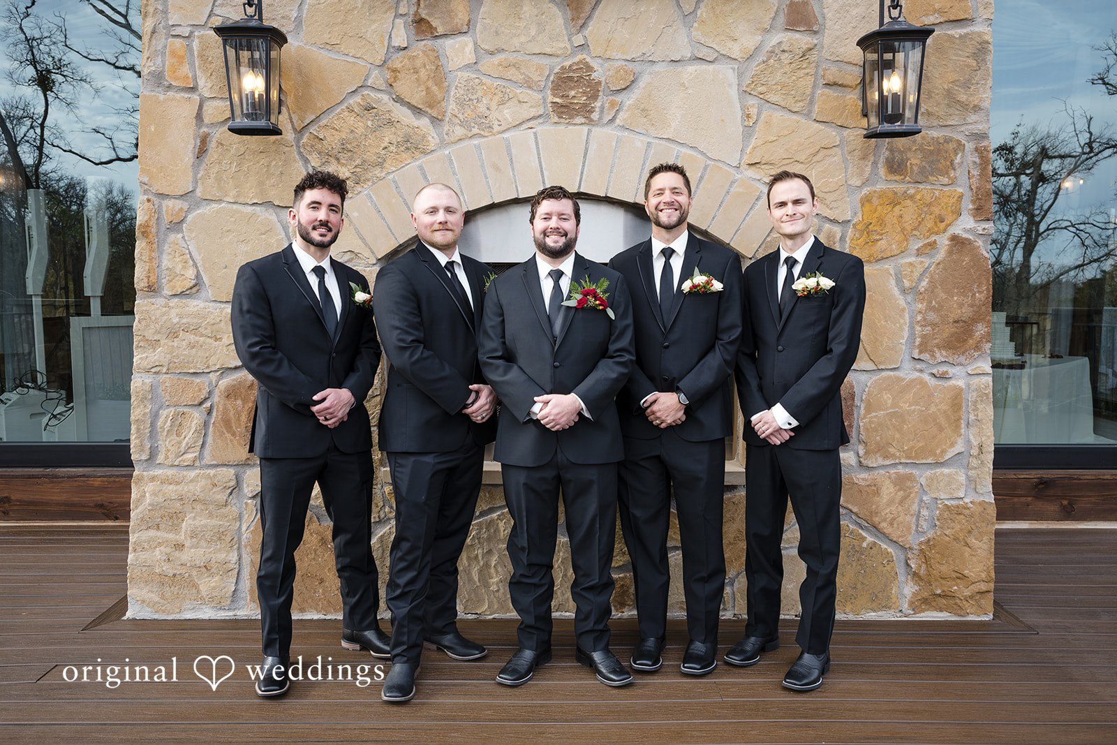 Groom and groomsmen portrait outdoors