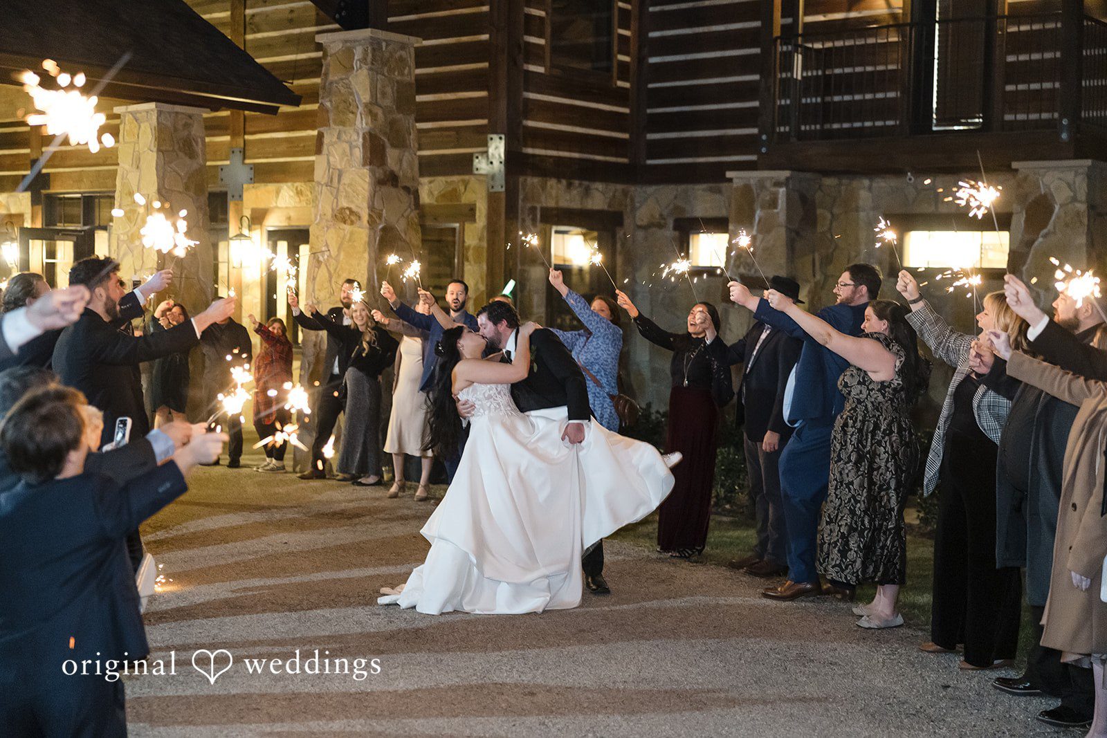 Reception dance floor celebration by Dallas Wedding Photographers