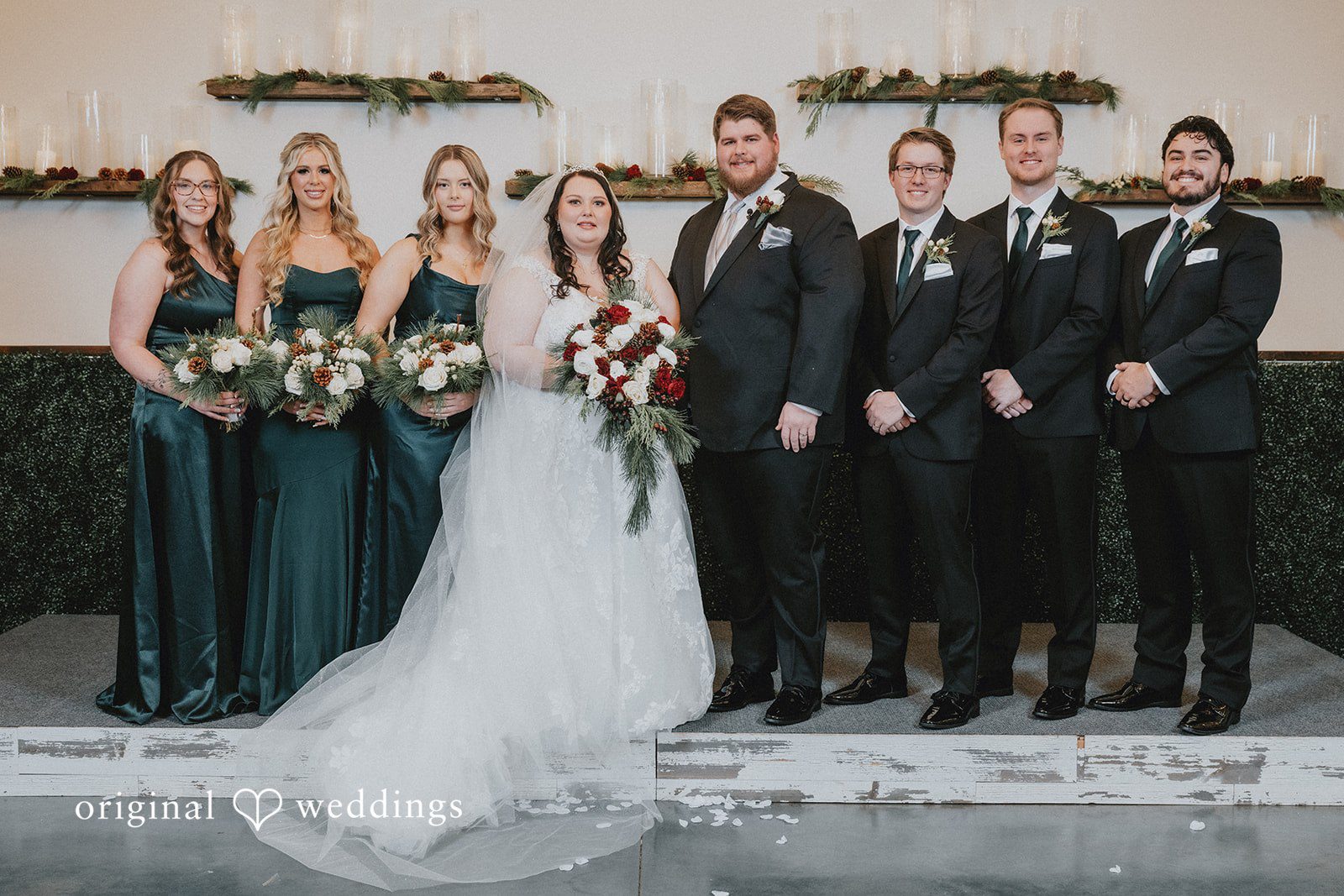 Our Kansas City wedding photographers captured a stunning portrait of the couple and their bridal party at The Stanley Event Space