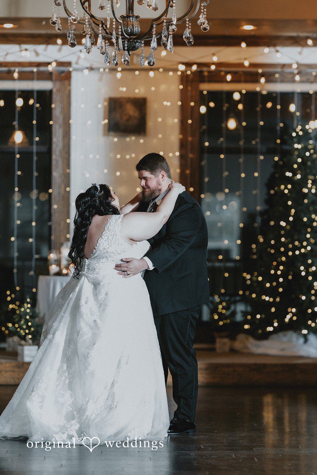 The couple takes their first dance