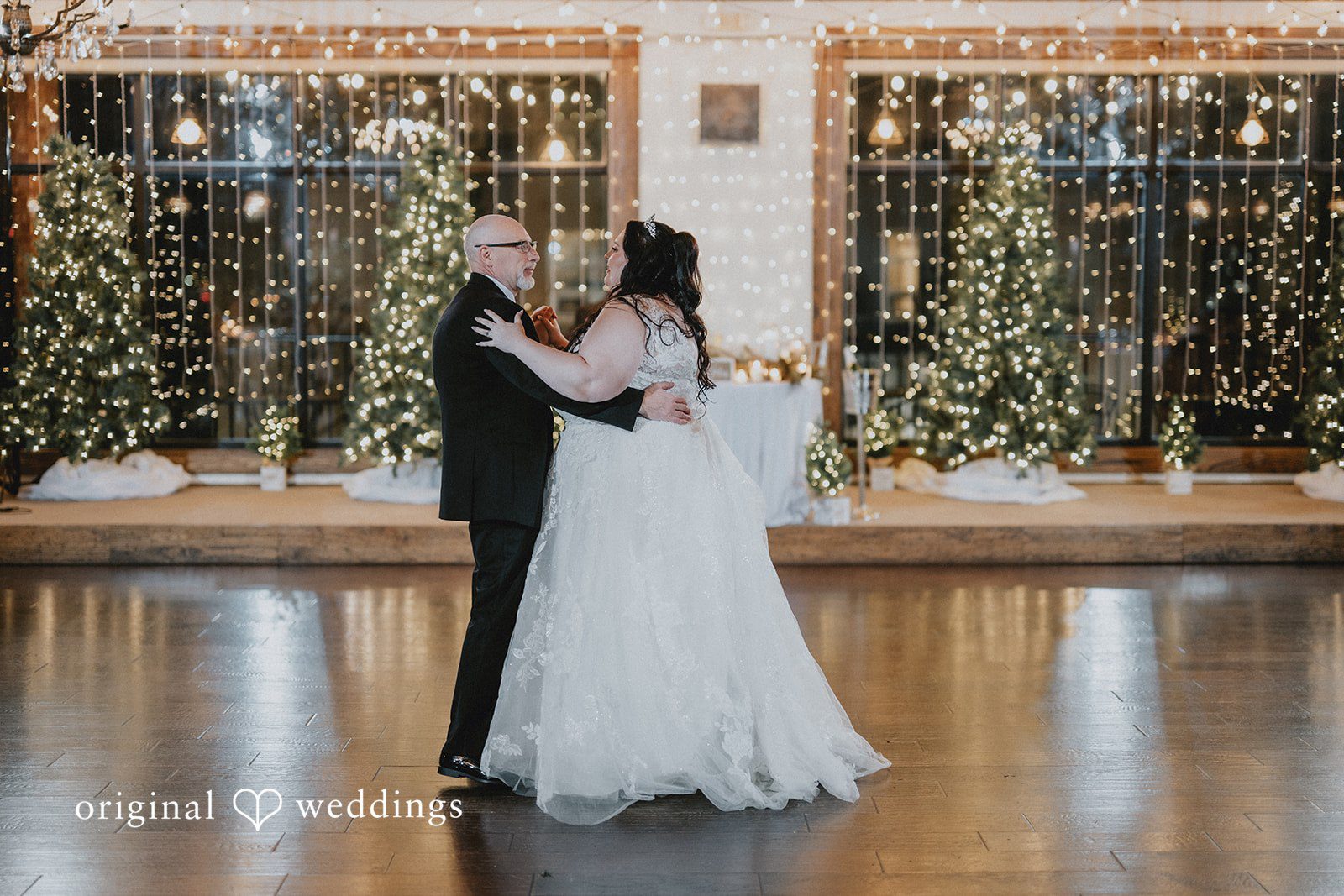 The bride dances with her father