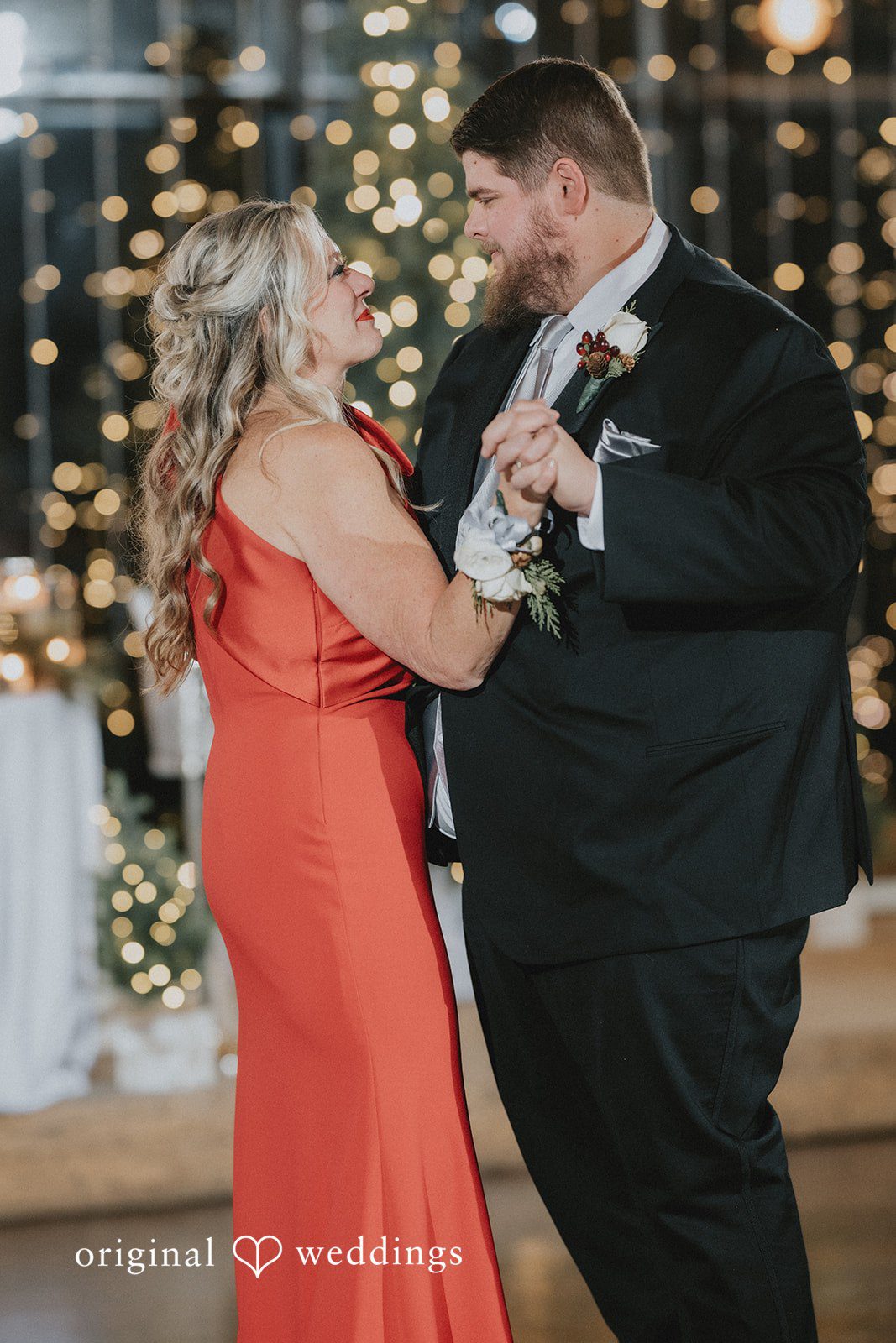 The groom dances with his mother