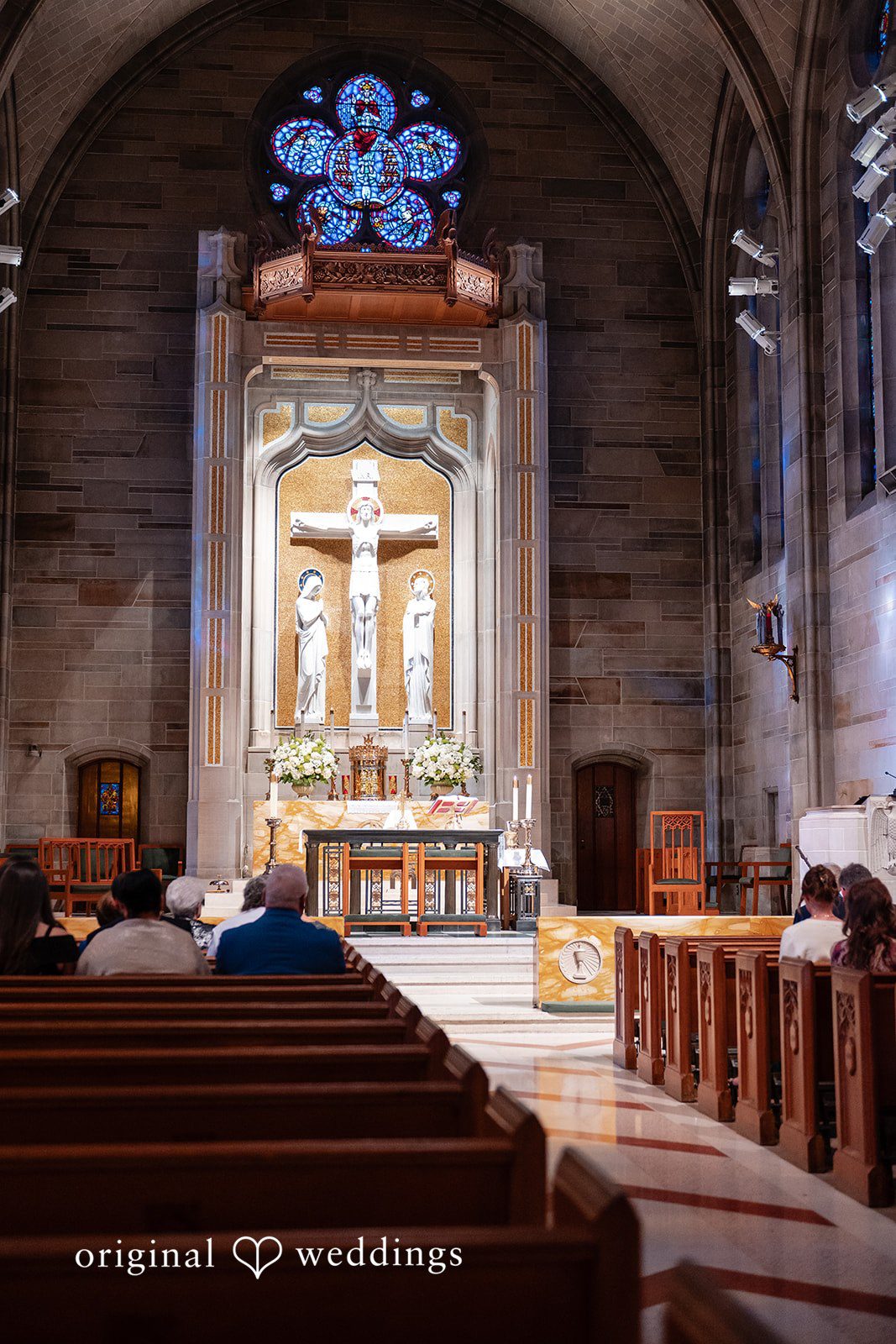Paola + Jeremy Indoor ceremony space with elegant church architecture