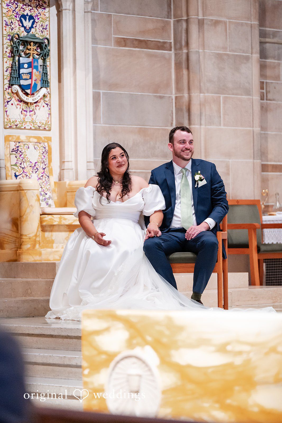Paola + Jeremy Bride and groom seated together during the ceremony