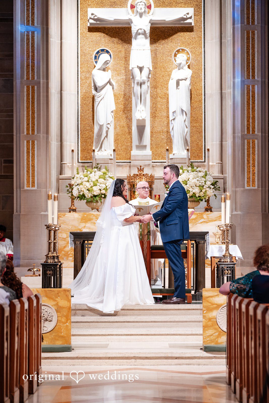 Paola + Jeremy Bride and groom during the wedding ceremony at the altar
