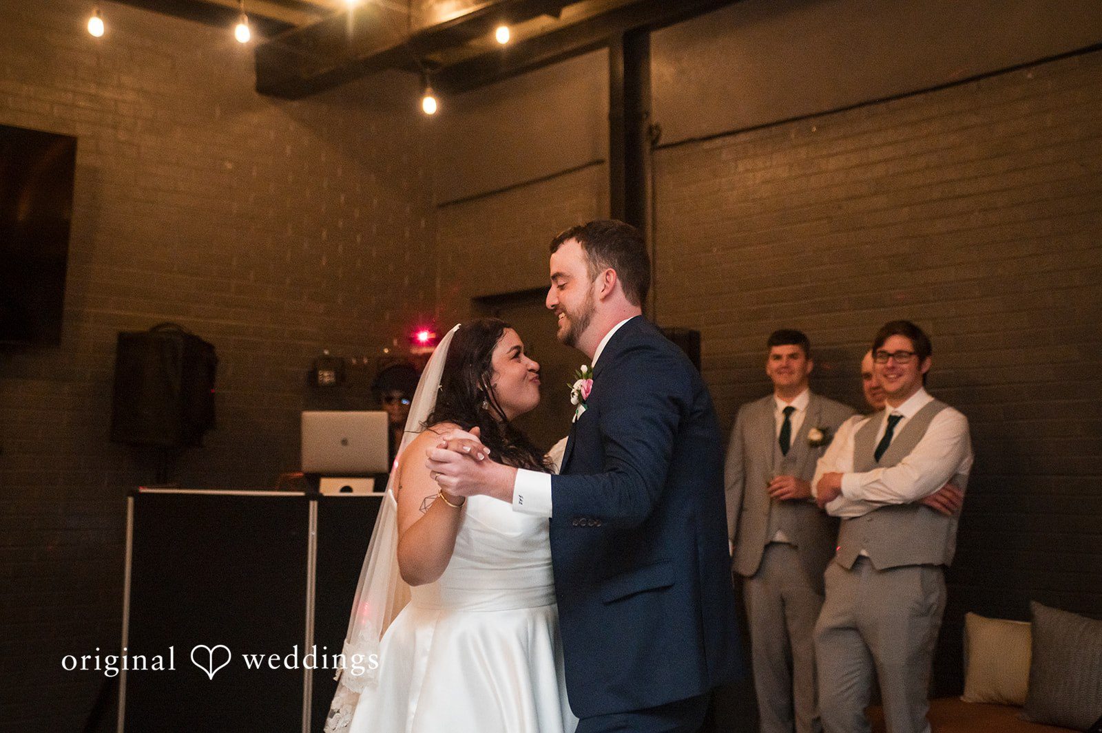 Paola + Jeremy Bride and groom sharing their first dance at the reception