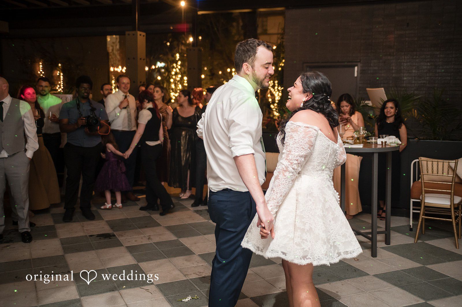 Paola + Jeremy Couple dancing together during the wedding reception