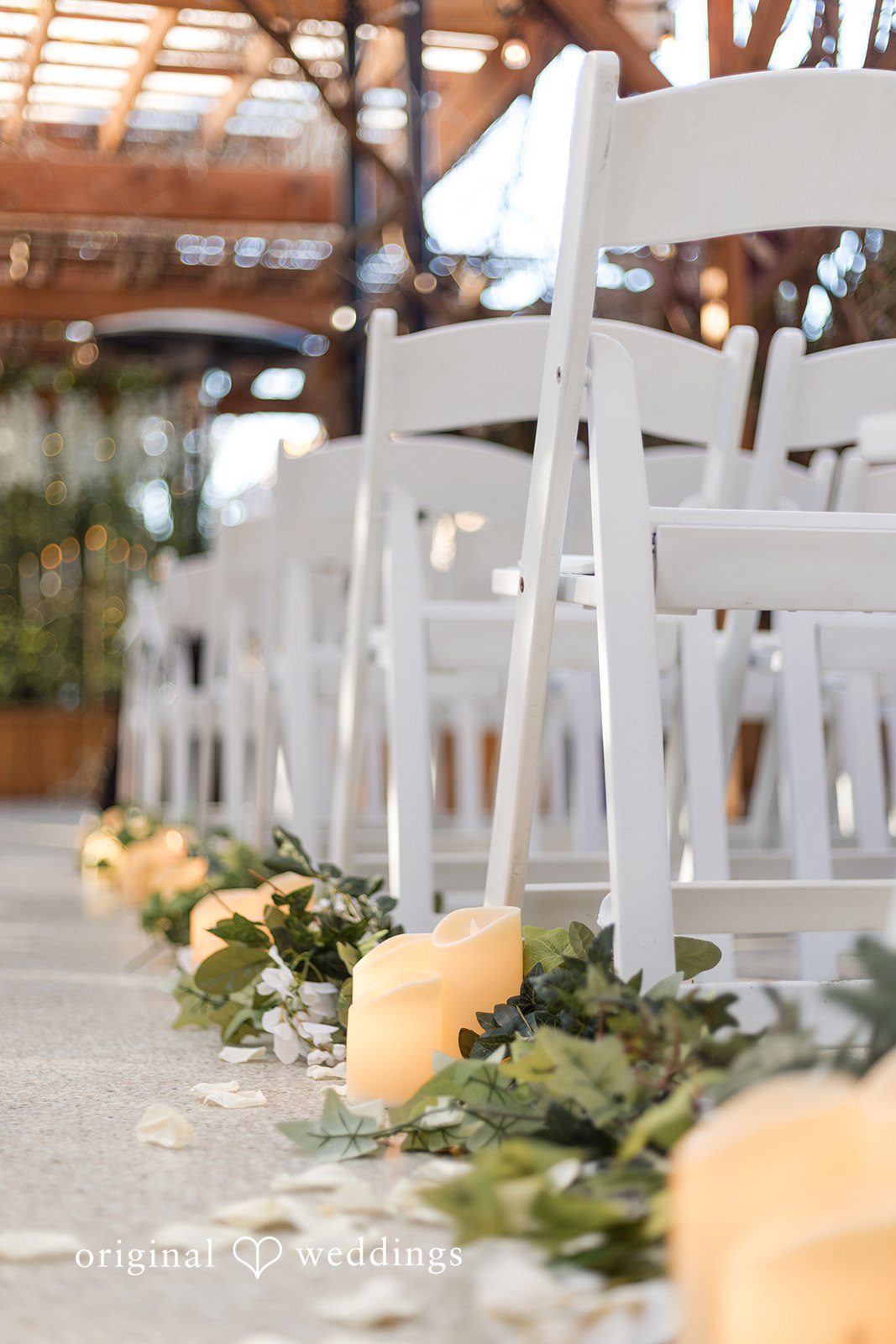 Ceremony chair and floral detail at the outdoor wedding venue