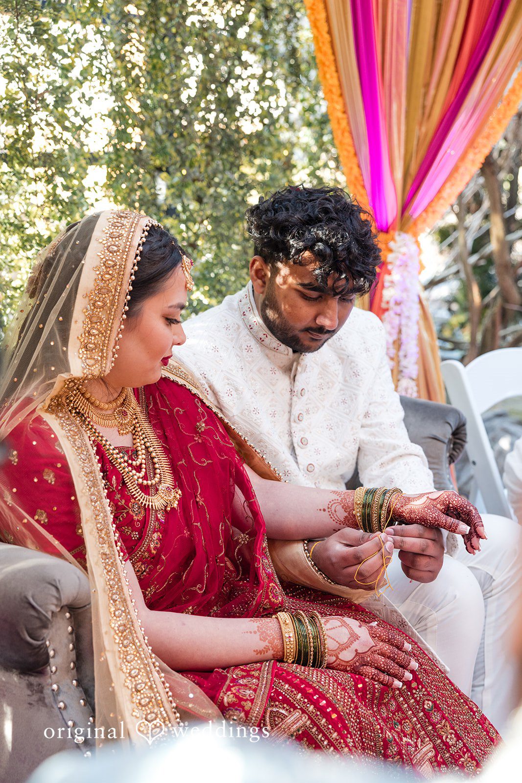 Taylor + Yash Lovely picture of couple doing some rituals at The Troutdale House