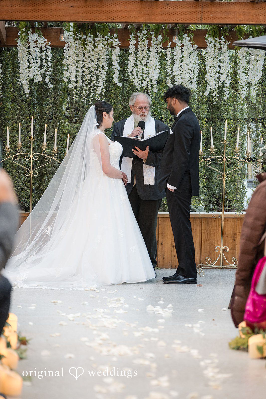Bride and groom exchanging vows during the ceremony