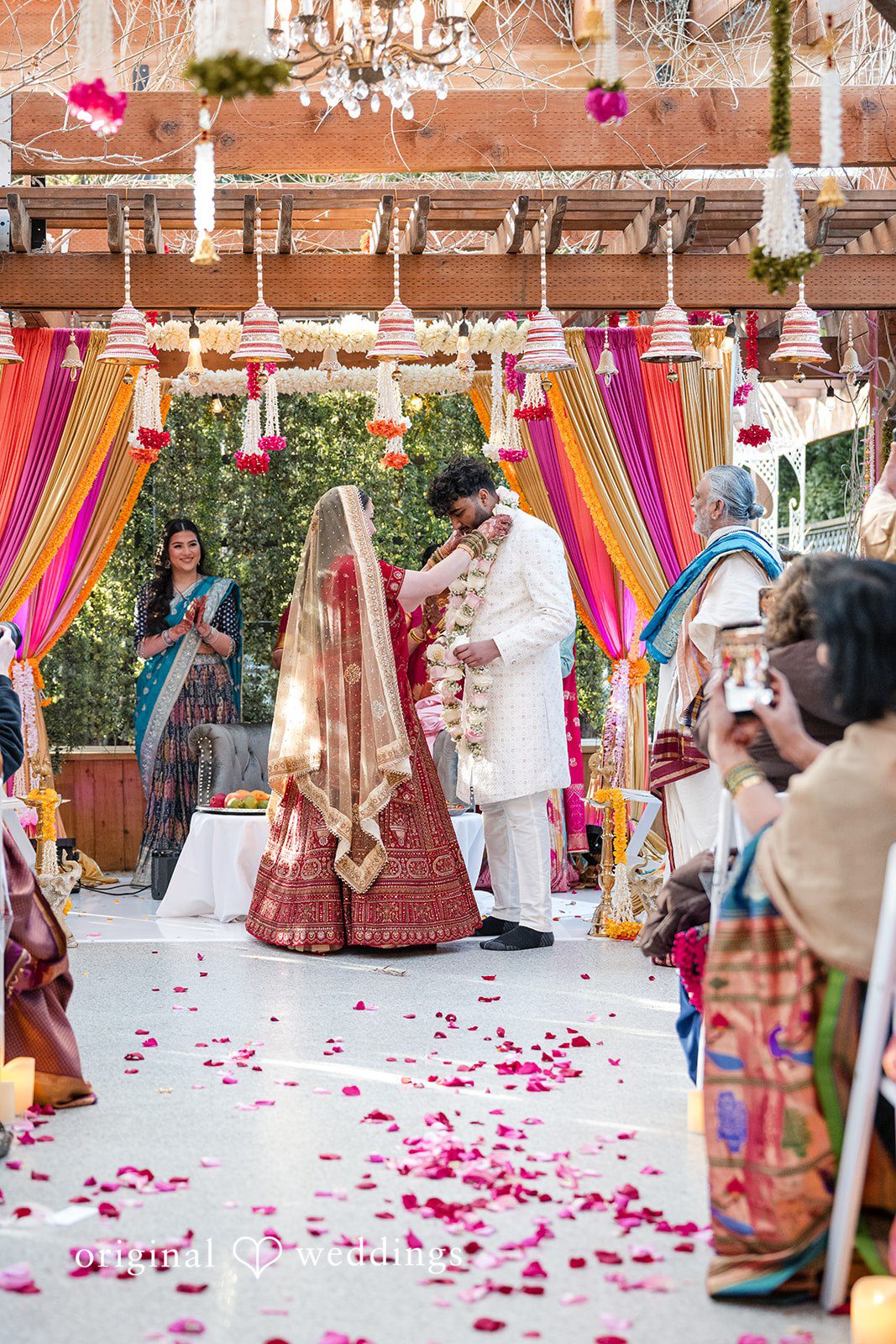 Taylor + Yash Couple doing rituals at The Troutdale House Indian Wedding