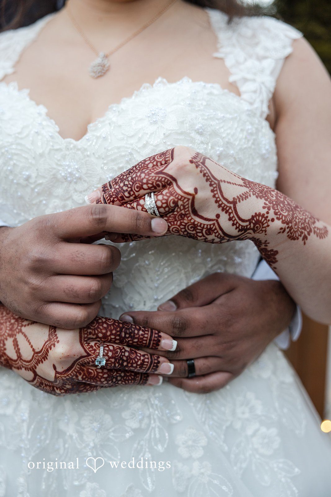 Bride showing intricate henna details during the wedding day
