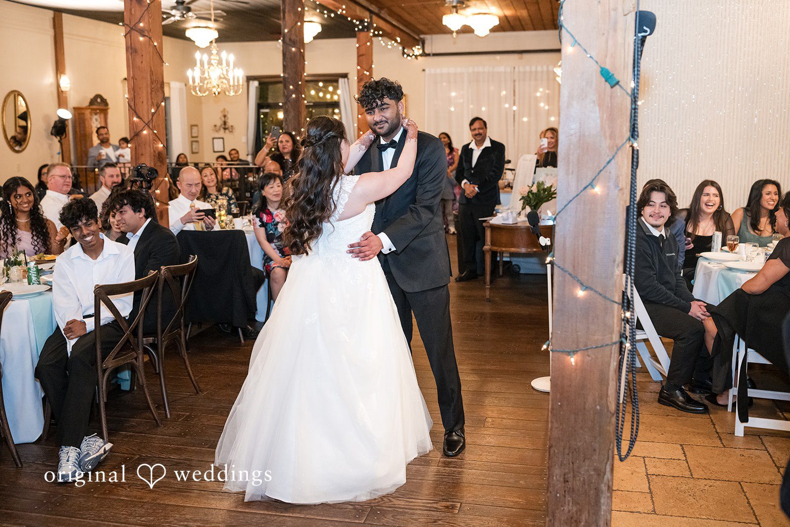 Bride and groom dancing during the reception