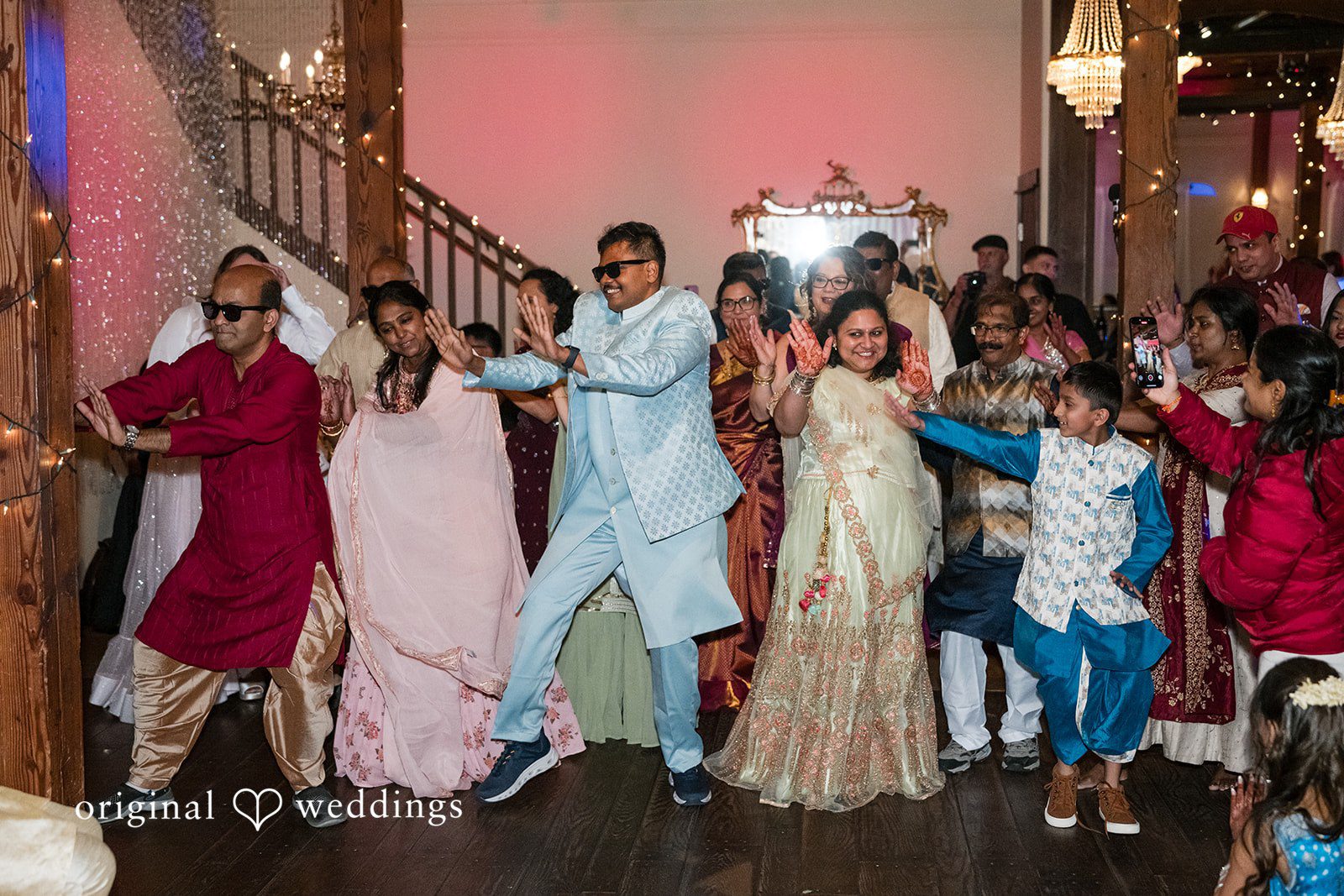 Taylor + Yash Group photo of guests at The Troutdale House Indian Wedding