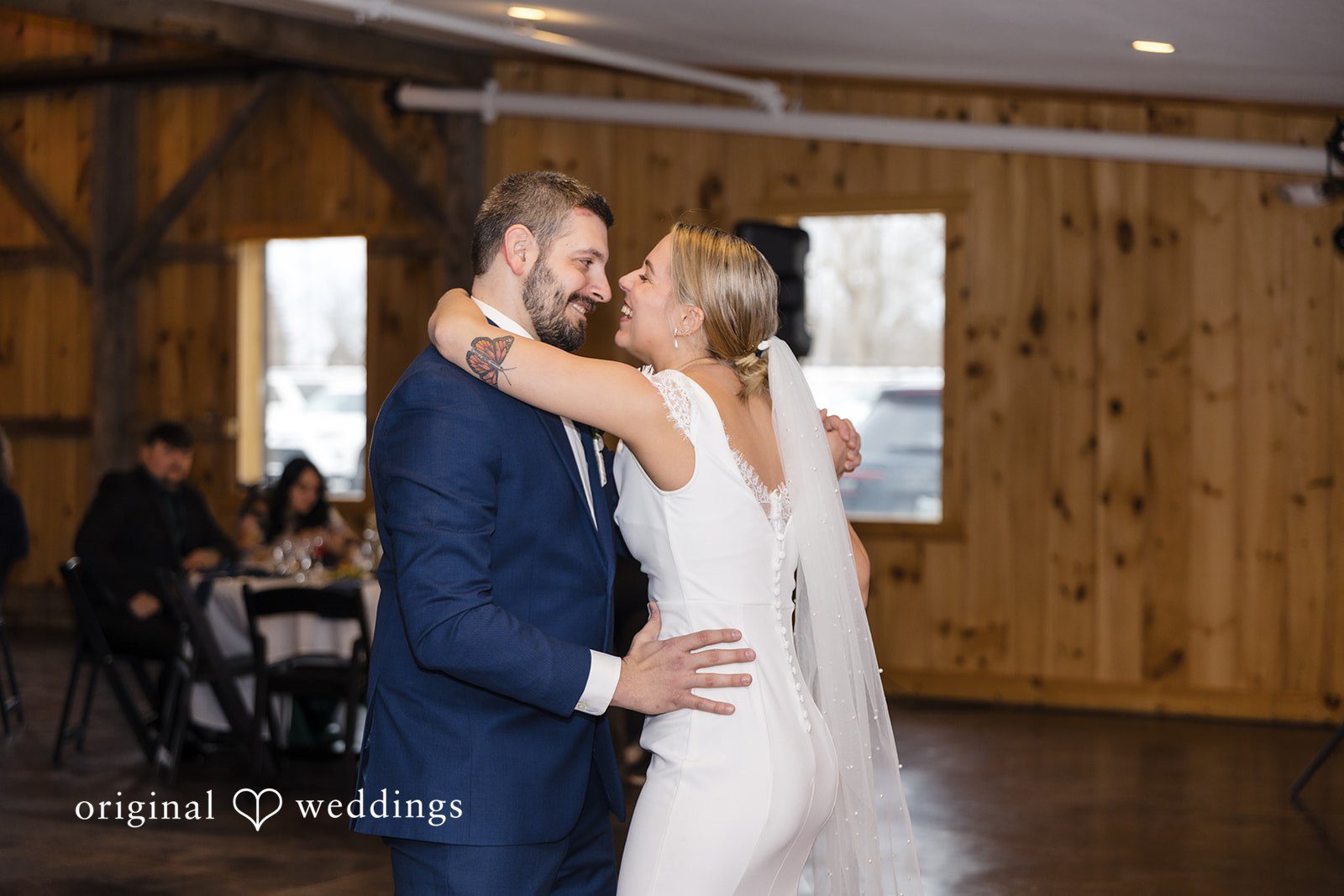 Alia + Lance Bride and groom embracing during their first dance.
