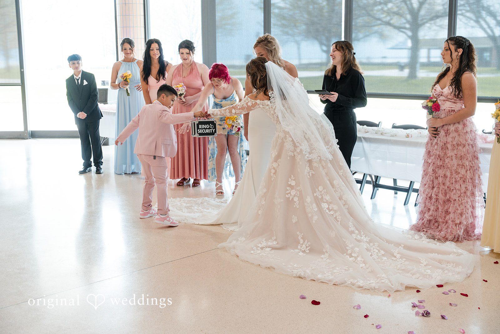 Fun and emotional ceremony moment shared between the brides