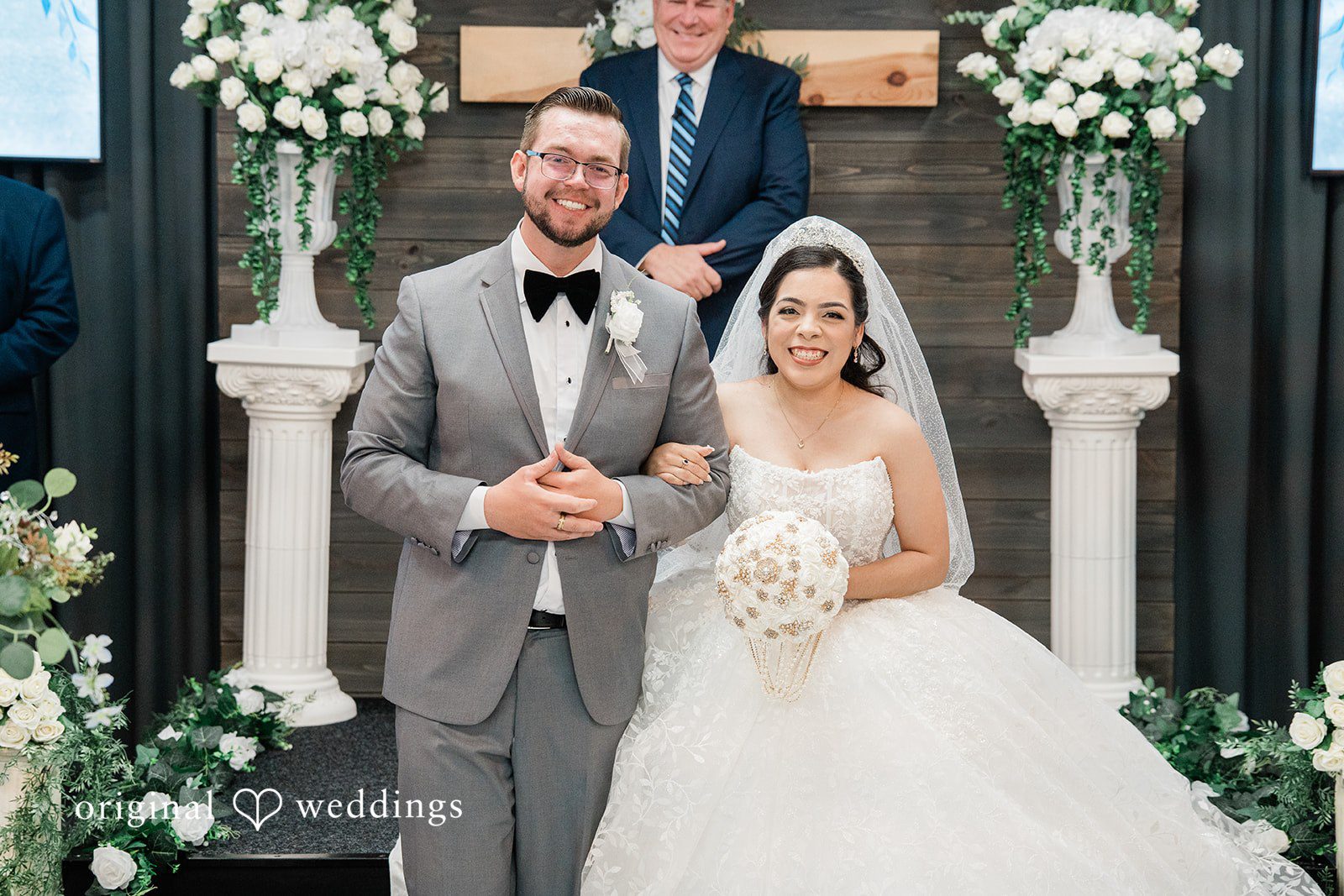 Los Angeles wedding photography by original weddings at Towngate Community Center capturing Bride and groom posing together