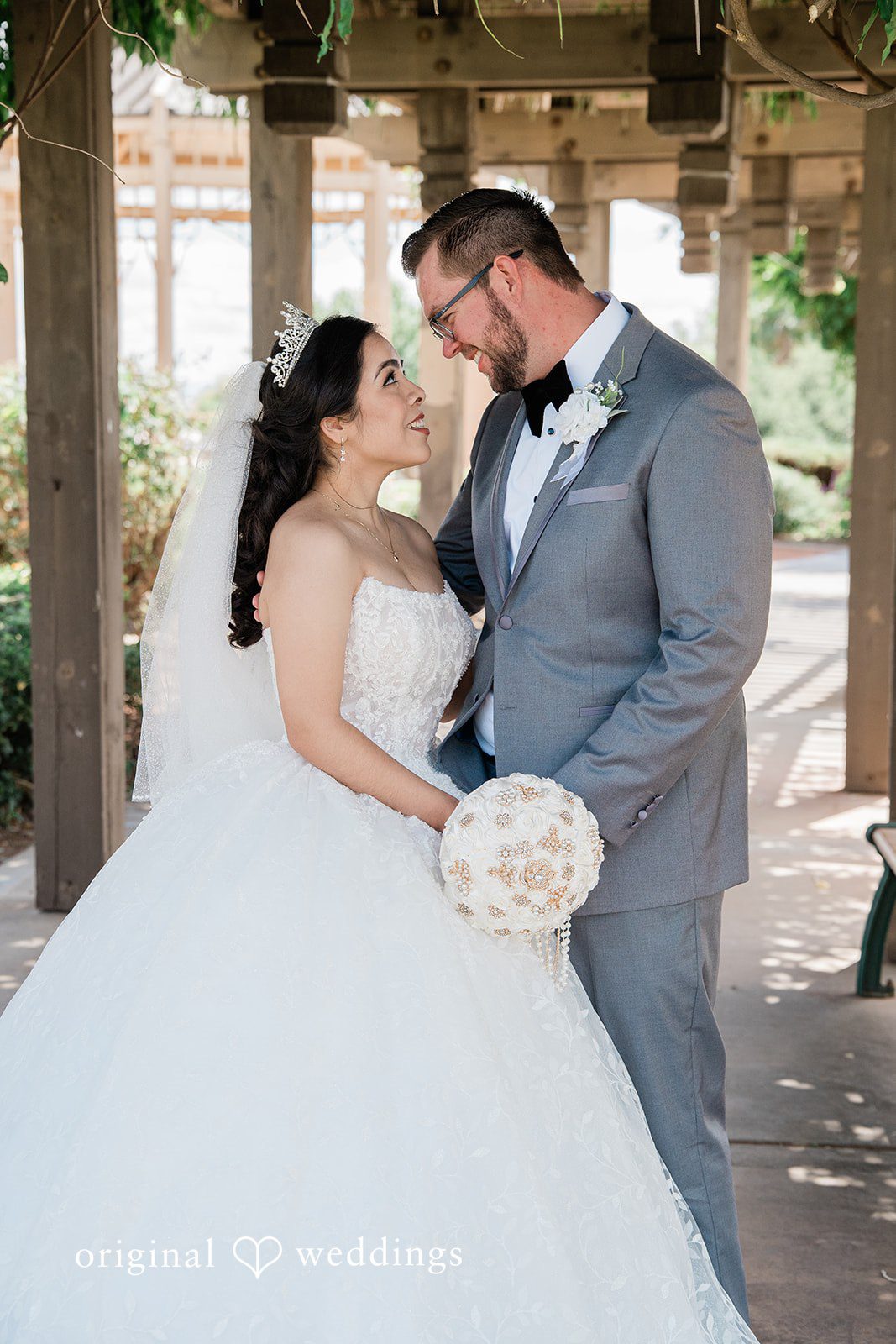 Bride and groom sharing a loving moment at Towngate Community Center