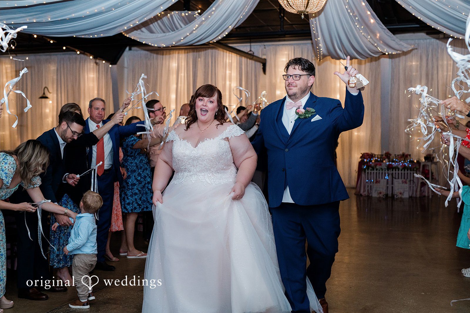 Hilary + Thomas The couple makes a joyful exit