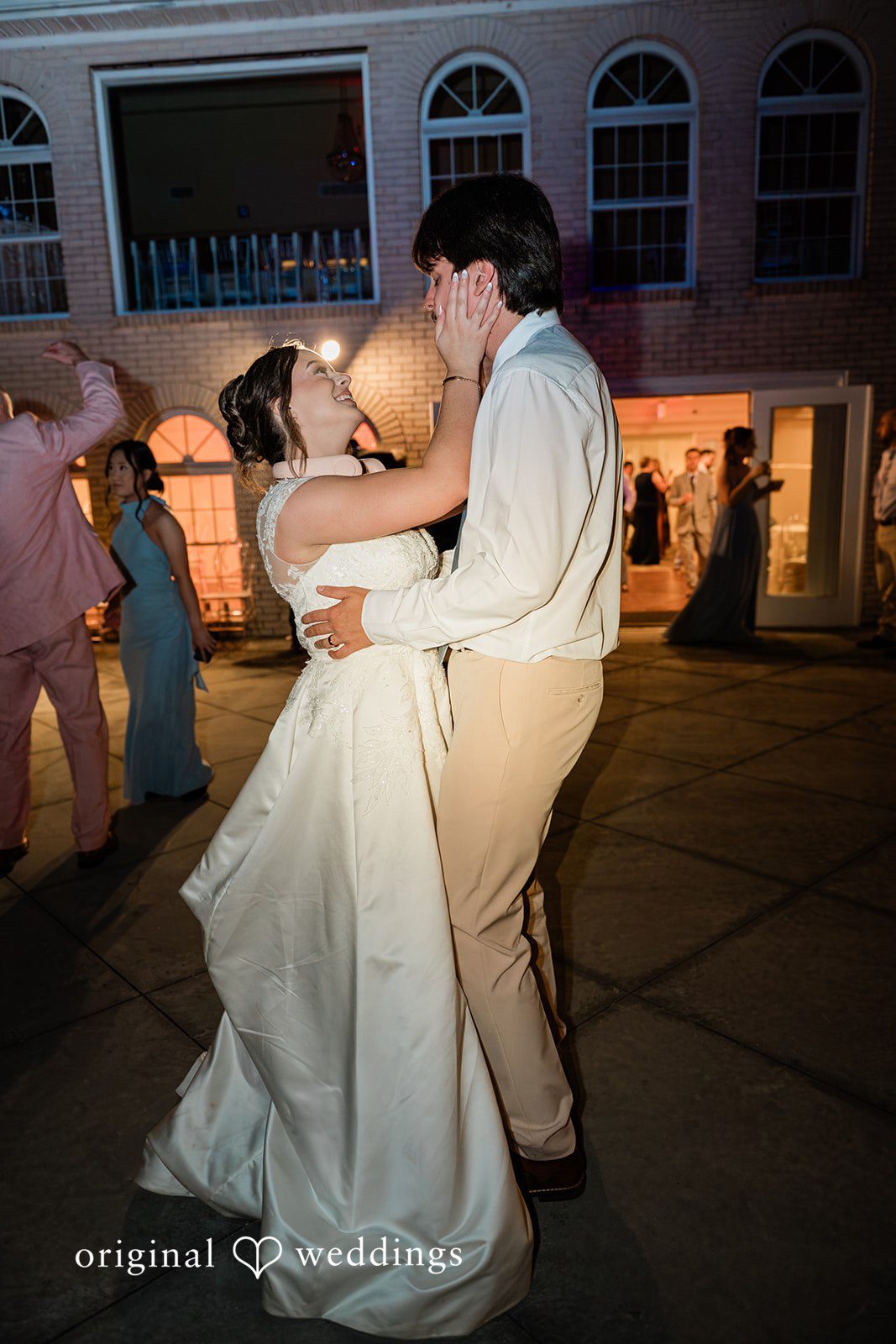 Elegant bride and groom dance moment during reception