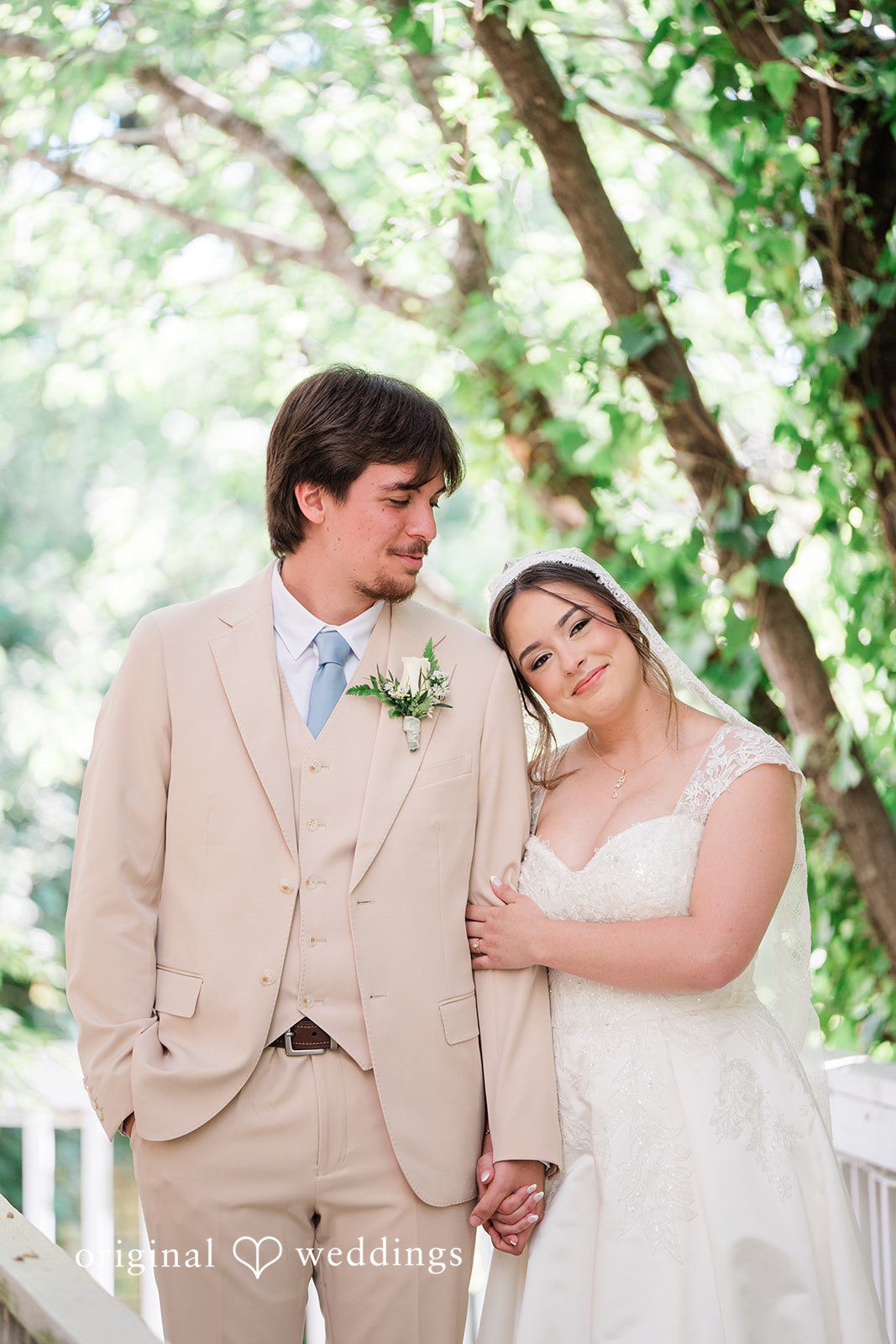 Soft natural light couple portrait with greenery background at Vines Mansion