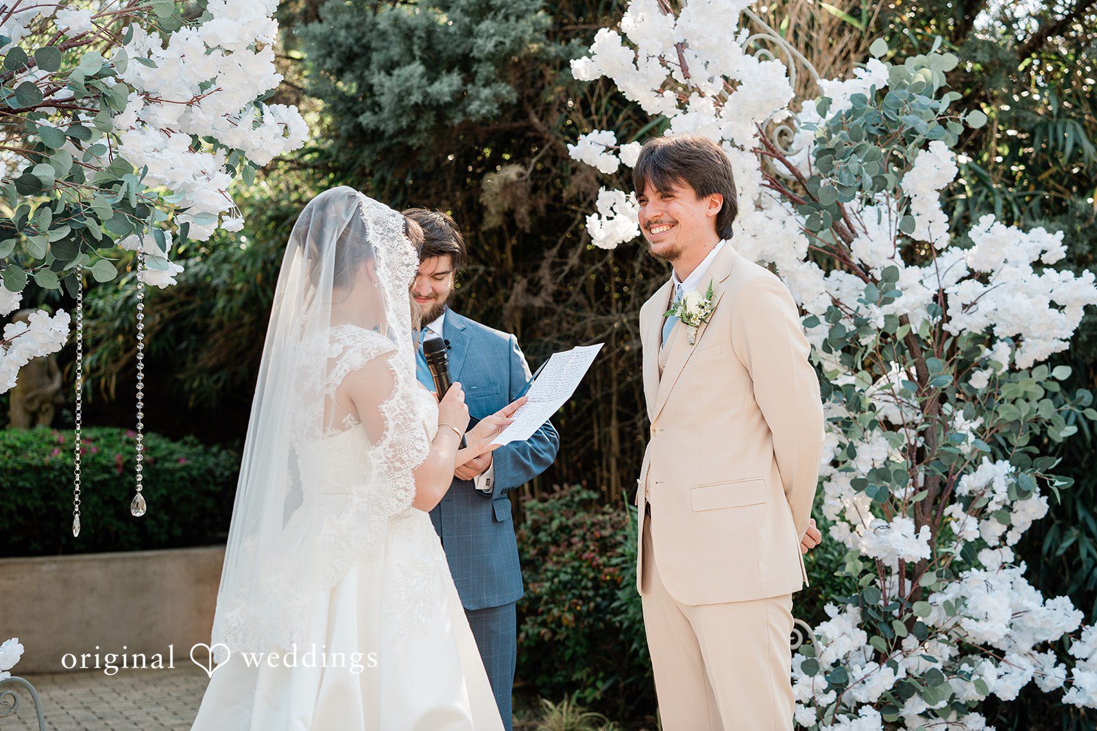 Bride focused on vow reading during ceremony