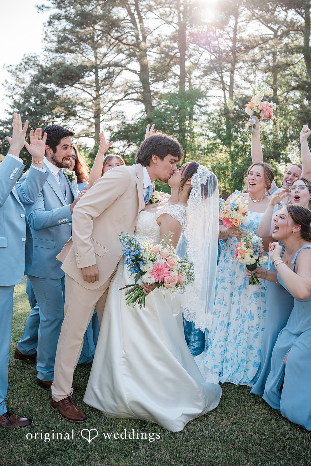 Emotional wedding kiss shot at Vines Mansion