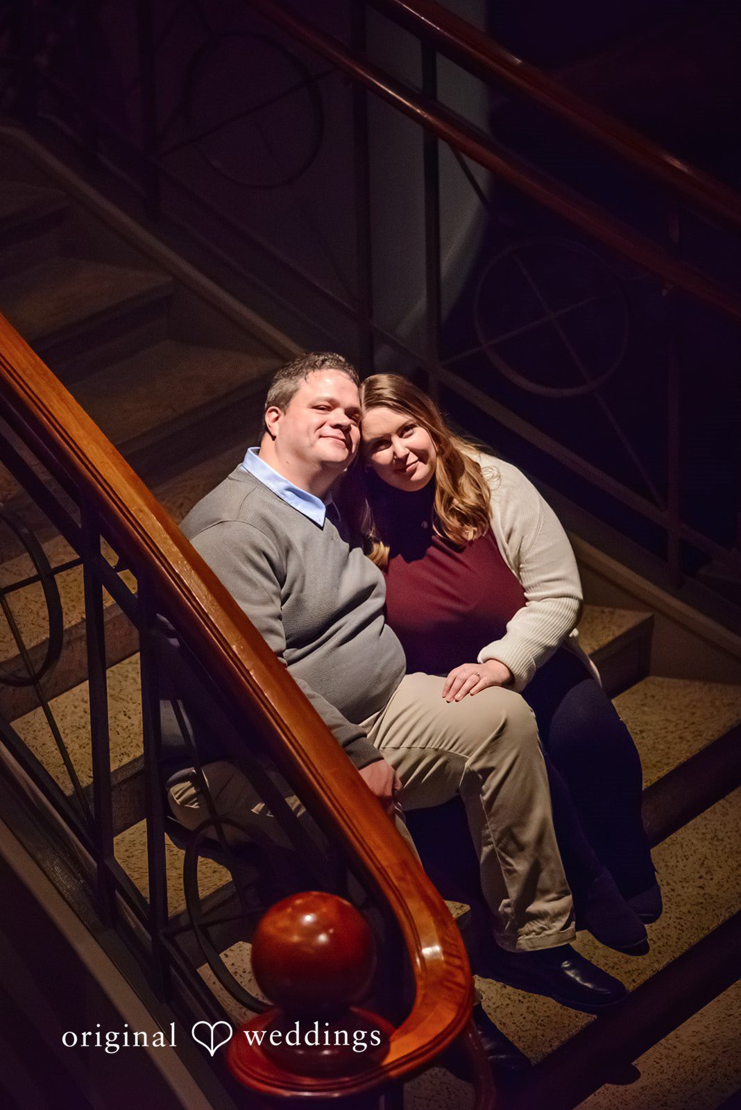 Nicole + Greg A portrait of the couple on the stairs