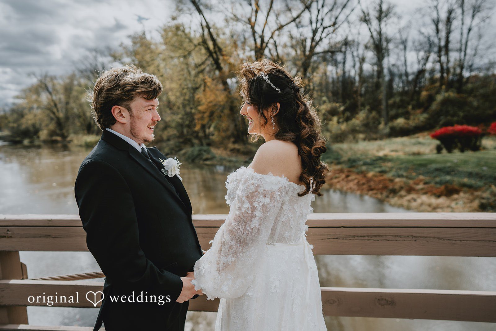 Romantic couple looking at each other and smiling at West Hills Country Club